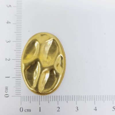 AC LATÃO CRATERA OVAL G 35MM S/FUROS